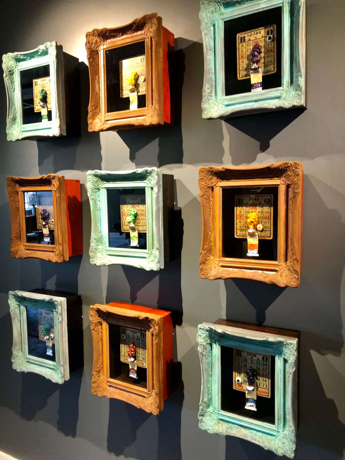 Art by Marshall Harris in Shadow Boxes with artifacts inside